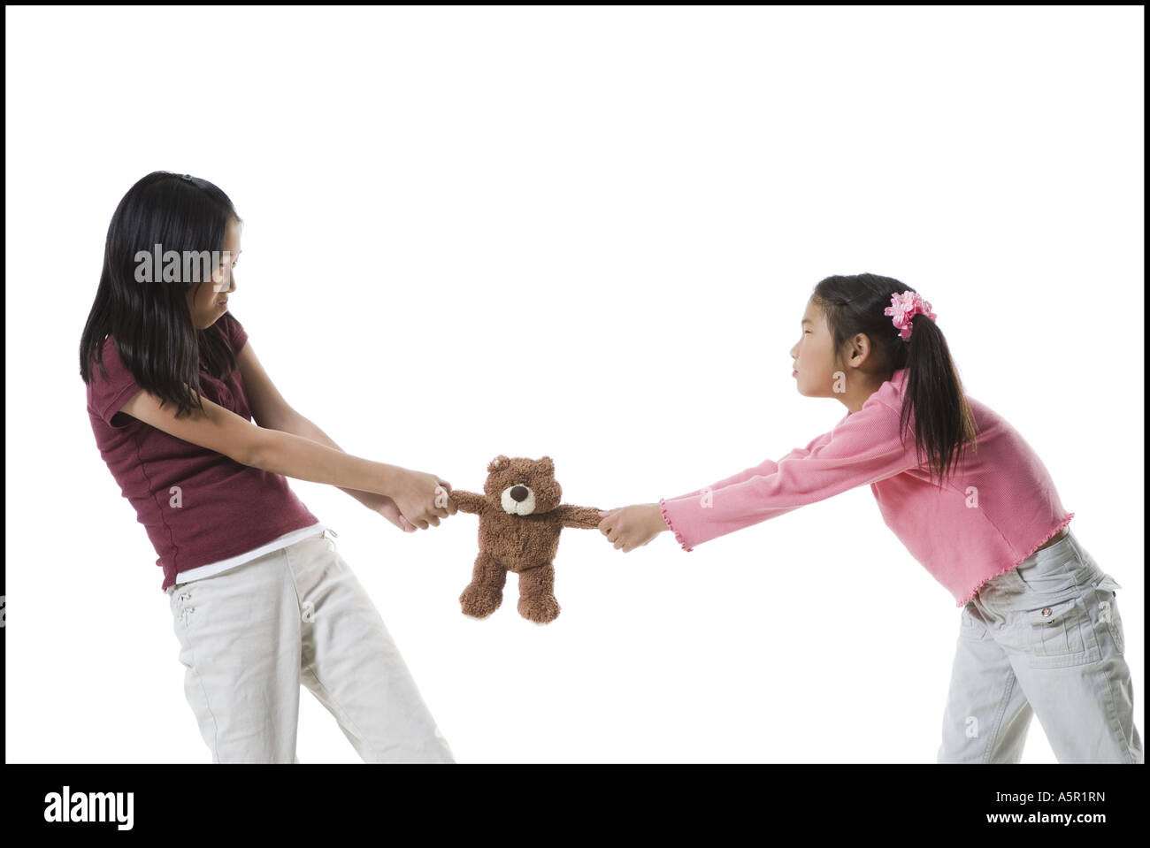 Child fighting over toy hires stock photography and images Alamy