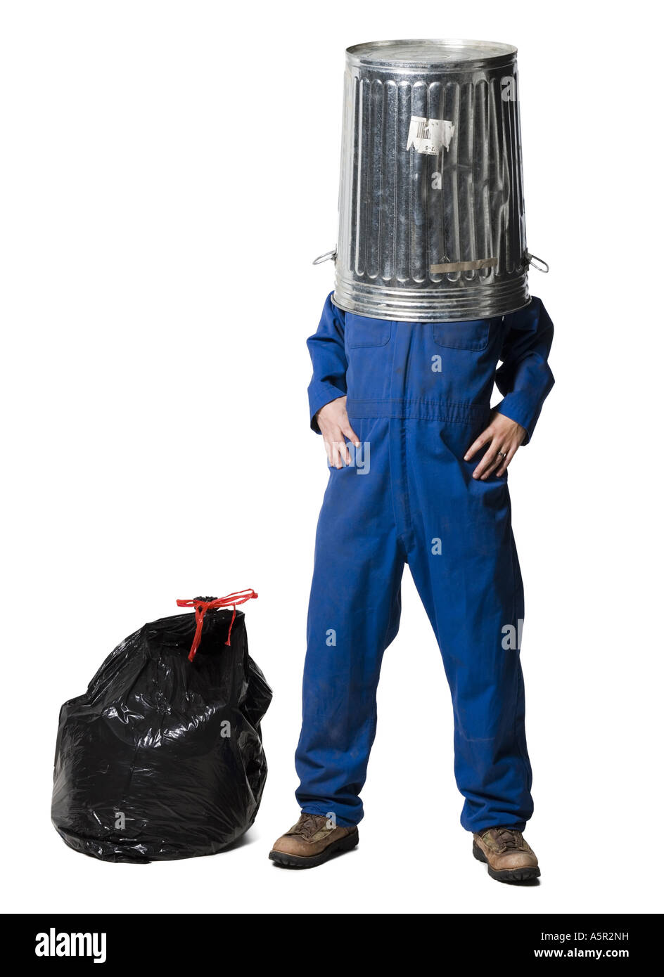 Garbage man with trash can on head Stock Photo