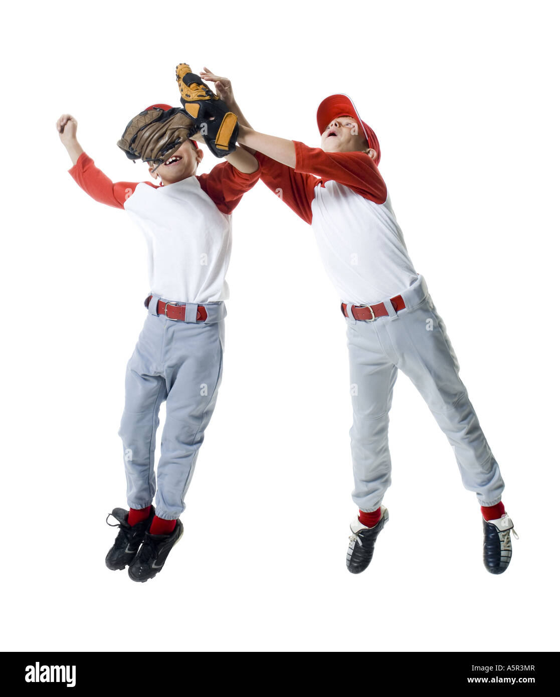 Two baseball players jumping Stock Photo Alamy