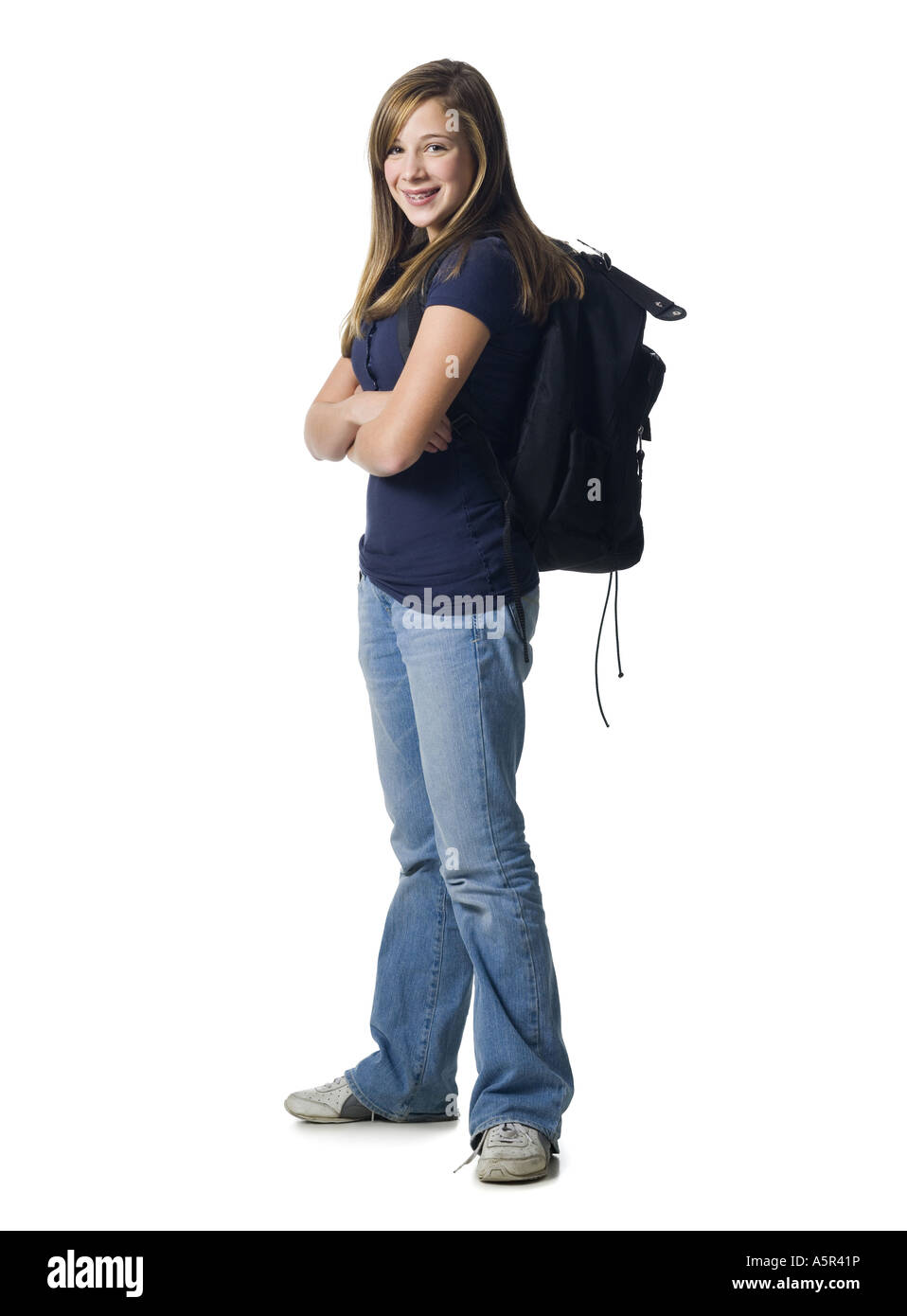 Girl with backpack smiling Stock Photo - Alamy