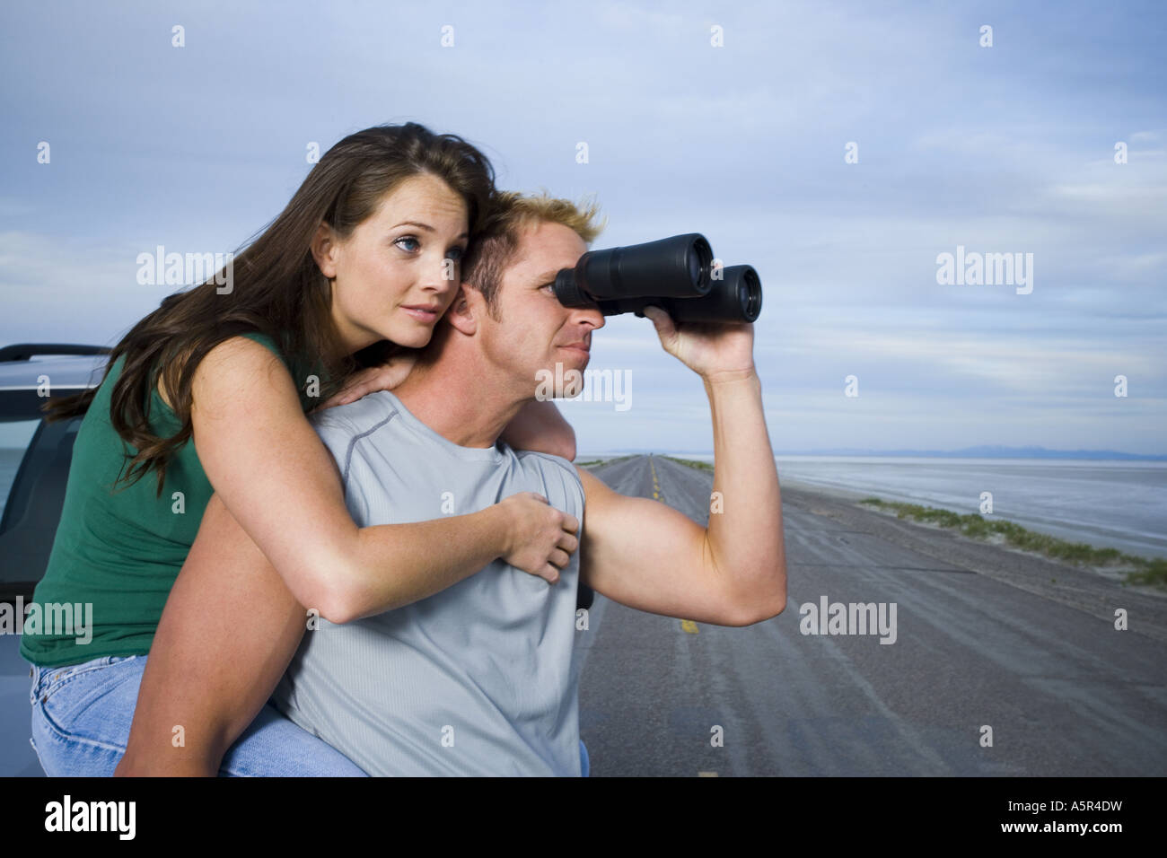 Profile of a mid adult man and a young woman Stock Photo - Alamy