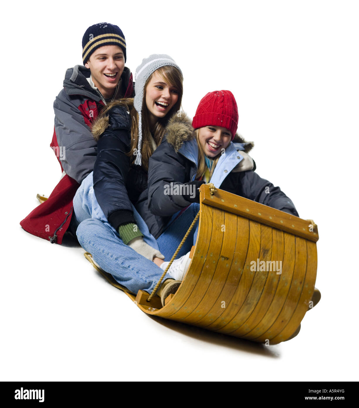 Family on toboggan Stock Photo Alamy