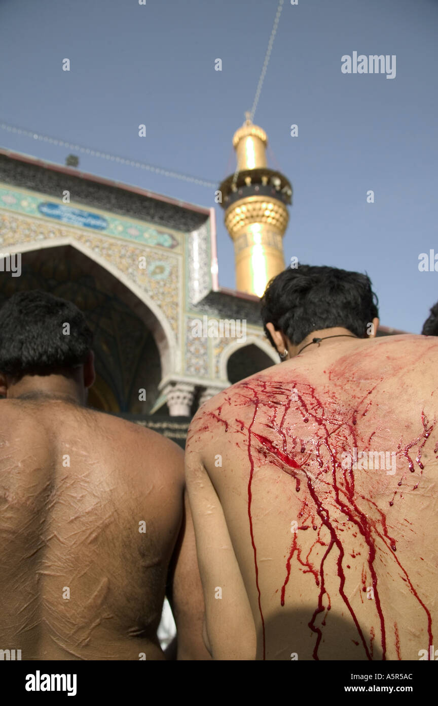 Pakistani pilgrims self-flagellating inside Imam Hussein's shrine in Karbala, Iraq, on Ashura's day. 02.03.04. Stock Photo