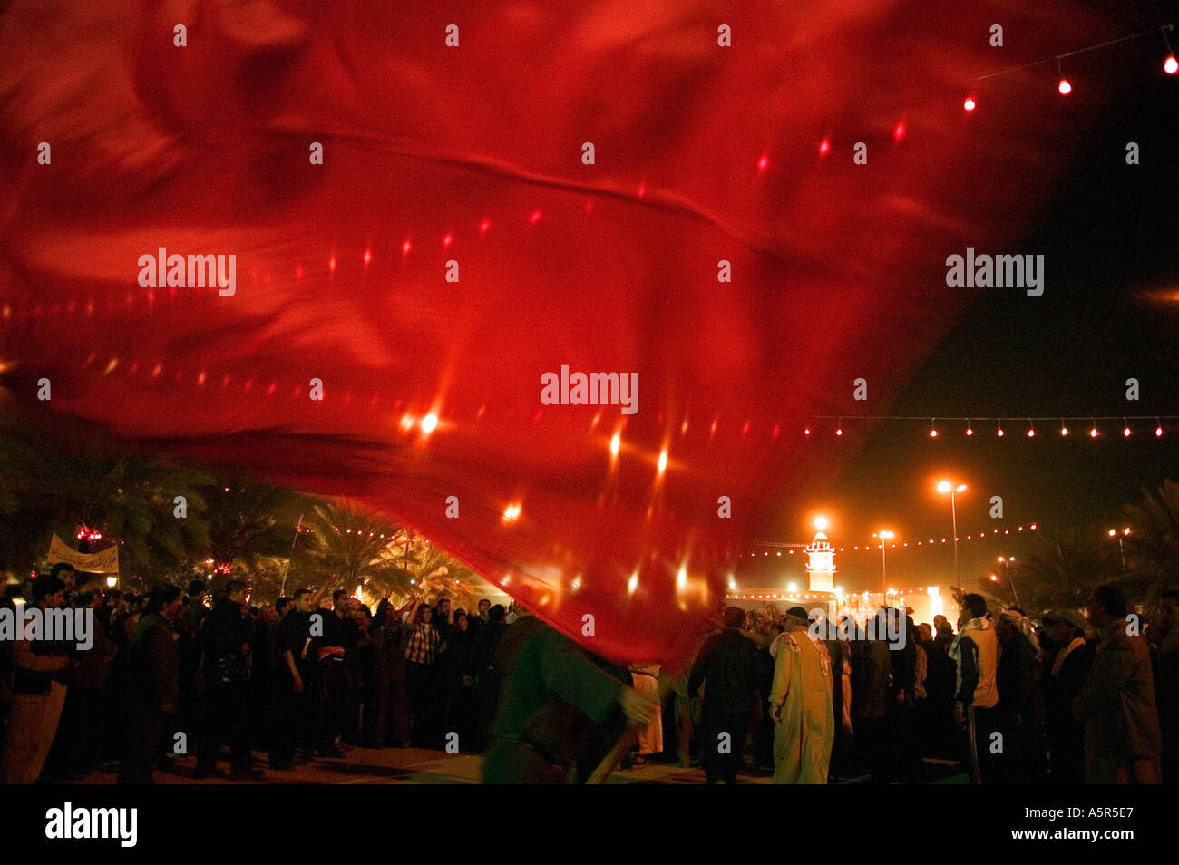 Flags in the air on Ashura's eve Karbala 01.03.04 Iraq Stock Photo