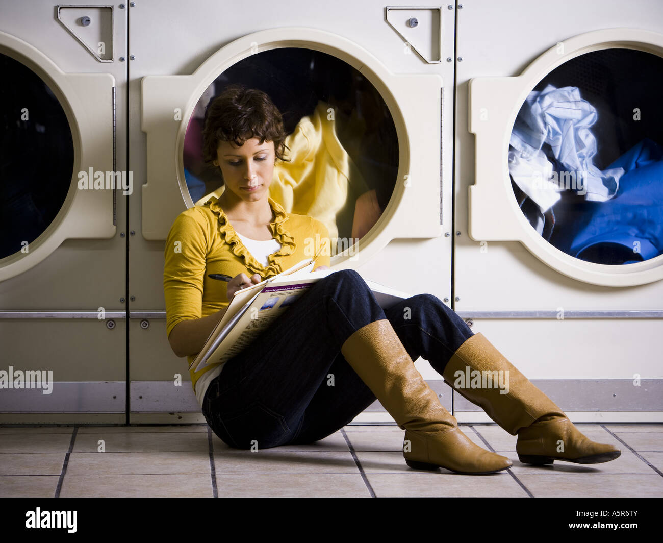 24/7 Laundromat Near Me: A Busy Student Doing Laundry in a Modern Laundromat