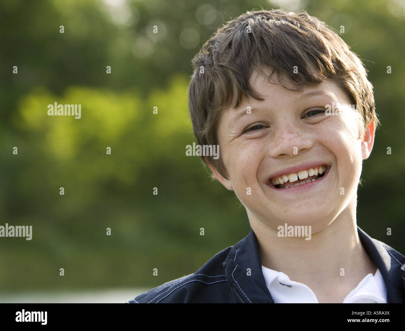 Portrait of a boy smiling Stock Photo - Alamy