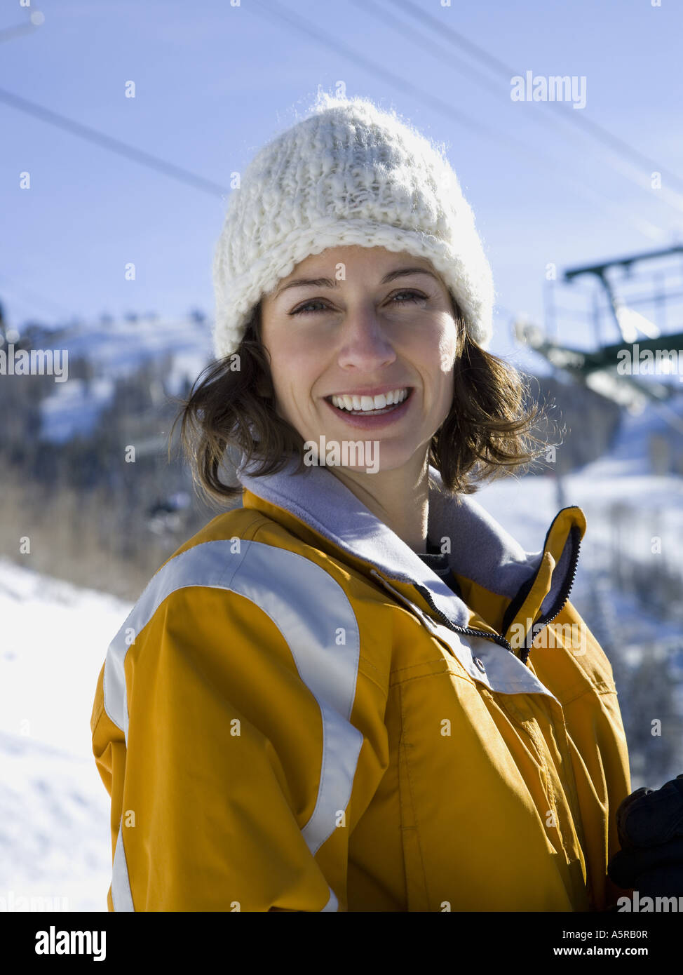Woman outdoors in winter smiling Stock Photo - Alamy