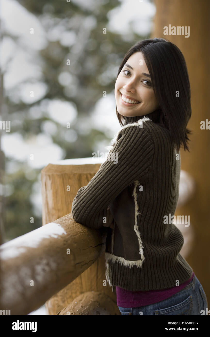 Woman outdoors in winter smiling Stock Photo - Alamy