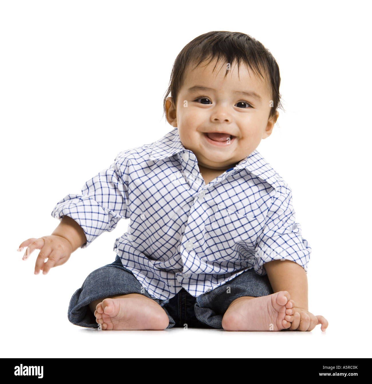 Baby Boy sitting and smiling Stock Photo