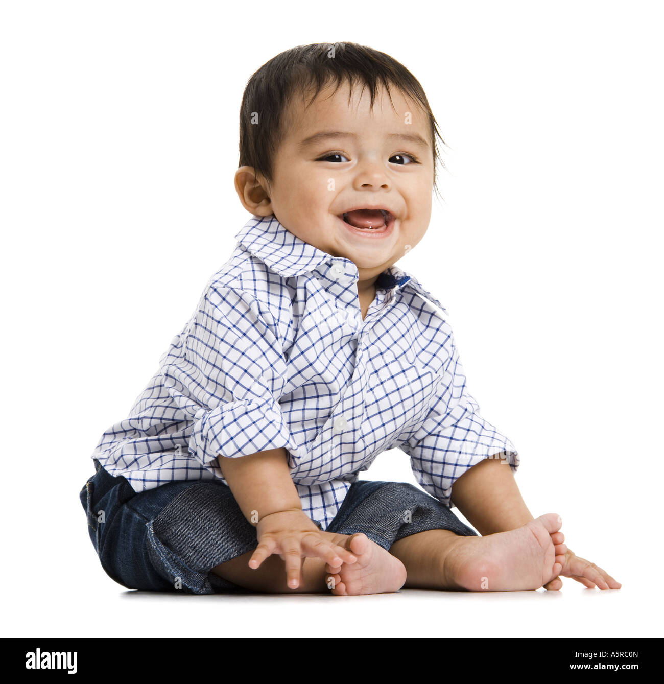 Baby Boy sitting and smiling Stock Photo