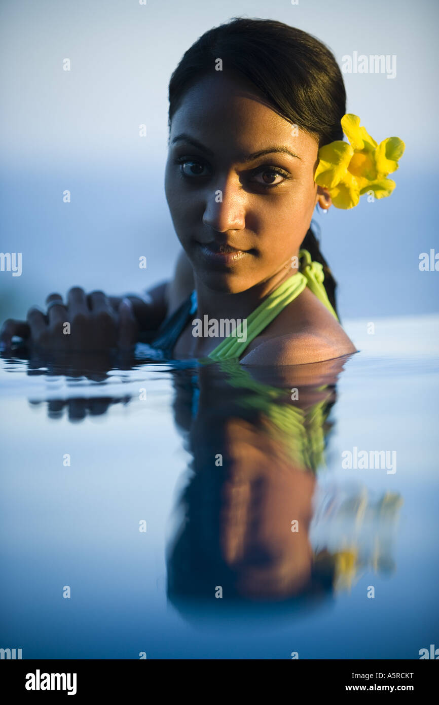 Portrait of a young woman in a swimming pool Stock Photo - Alamy