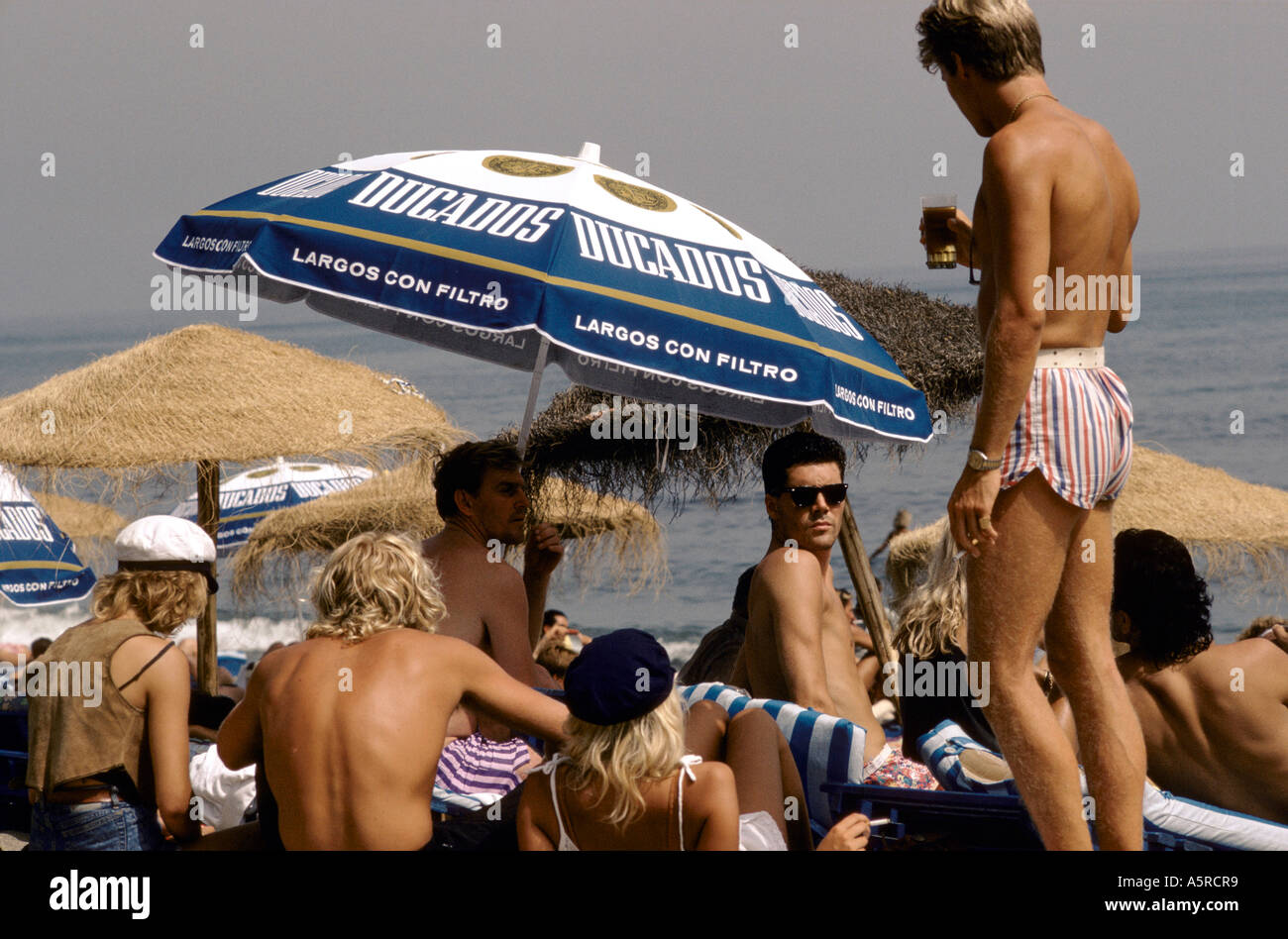 SPAIN MARBELLA PEOPLE ON BEACH Stock Photo