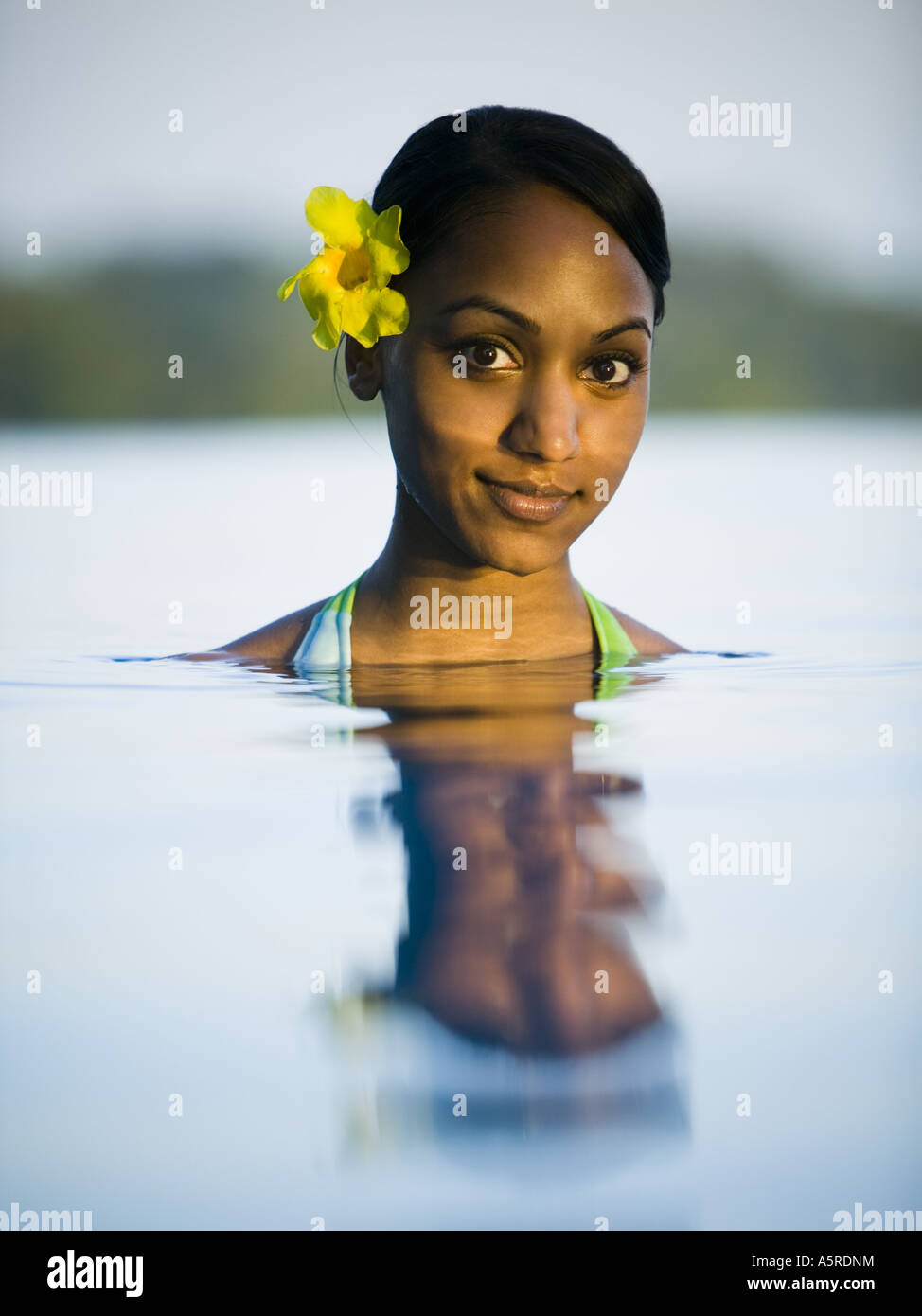 Portrait of a young woman in a swimming pool Stock Photo - Alamy