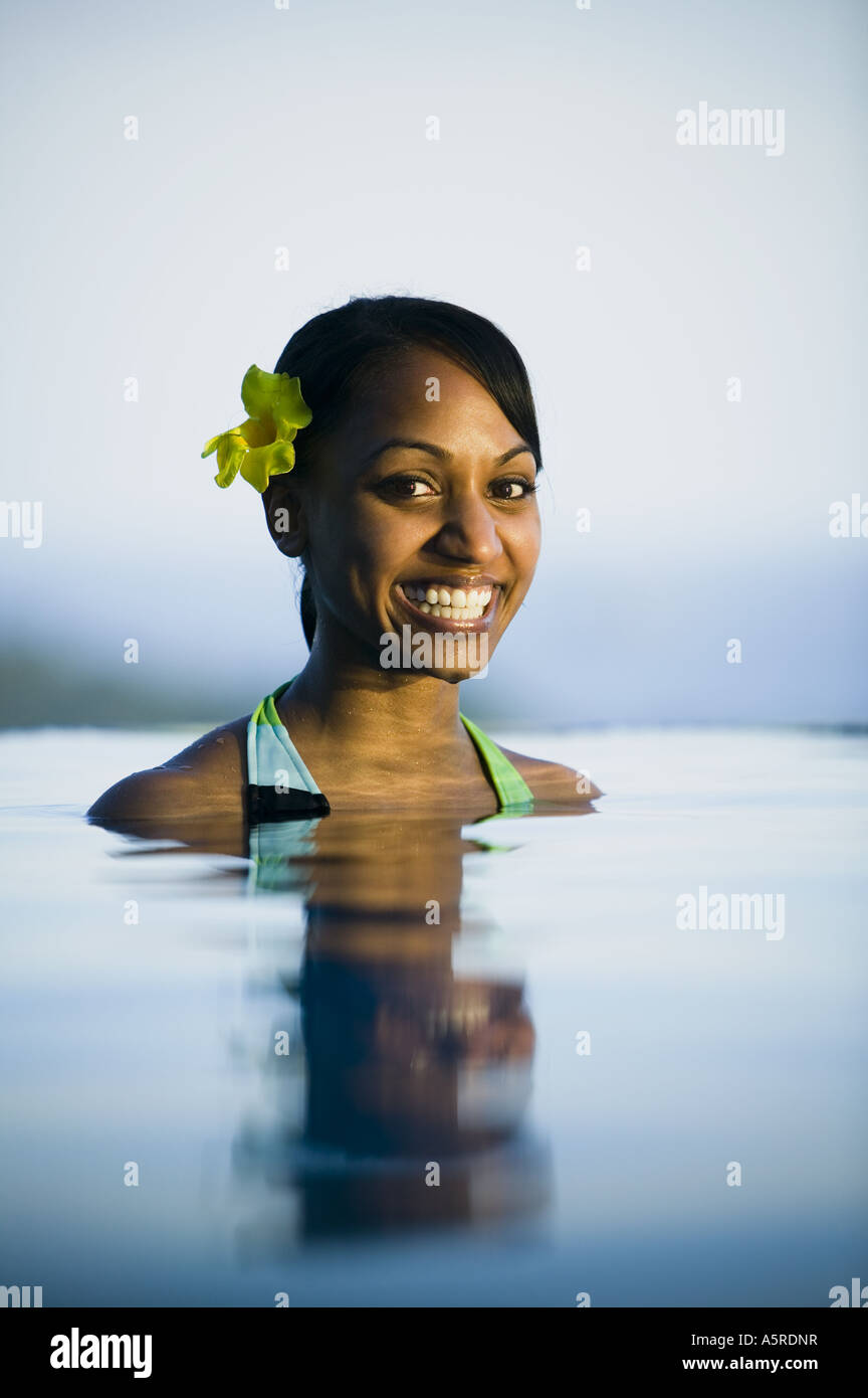 Portrait of a young woman in a swimming pool Stock Photo - Alamy