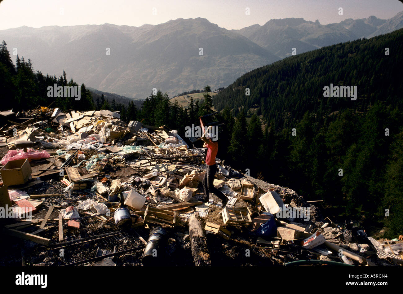 POLLUTION IN THE ALPS. A LARGE RUBBISH DUMP IN LA PLAGNE FRENCH ALPS