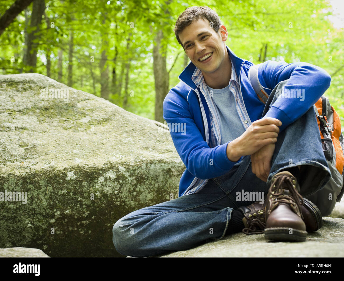 Portrait of a young man smiling Stock Photo - Alamy