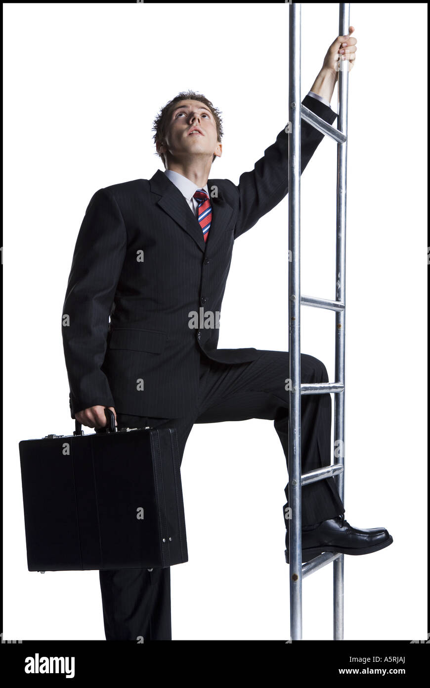 Businessman climbing corporate ladder Stock Photo - Alamy