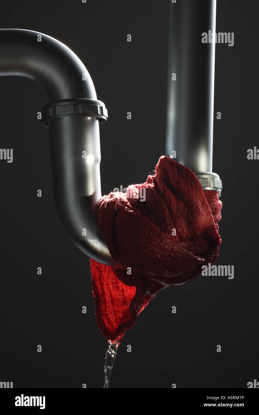 Leaking pipe with dripping rag Stock Photo Alamy