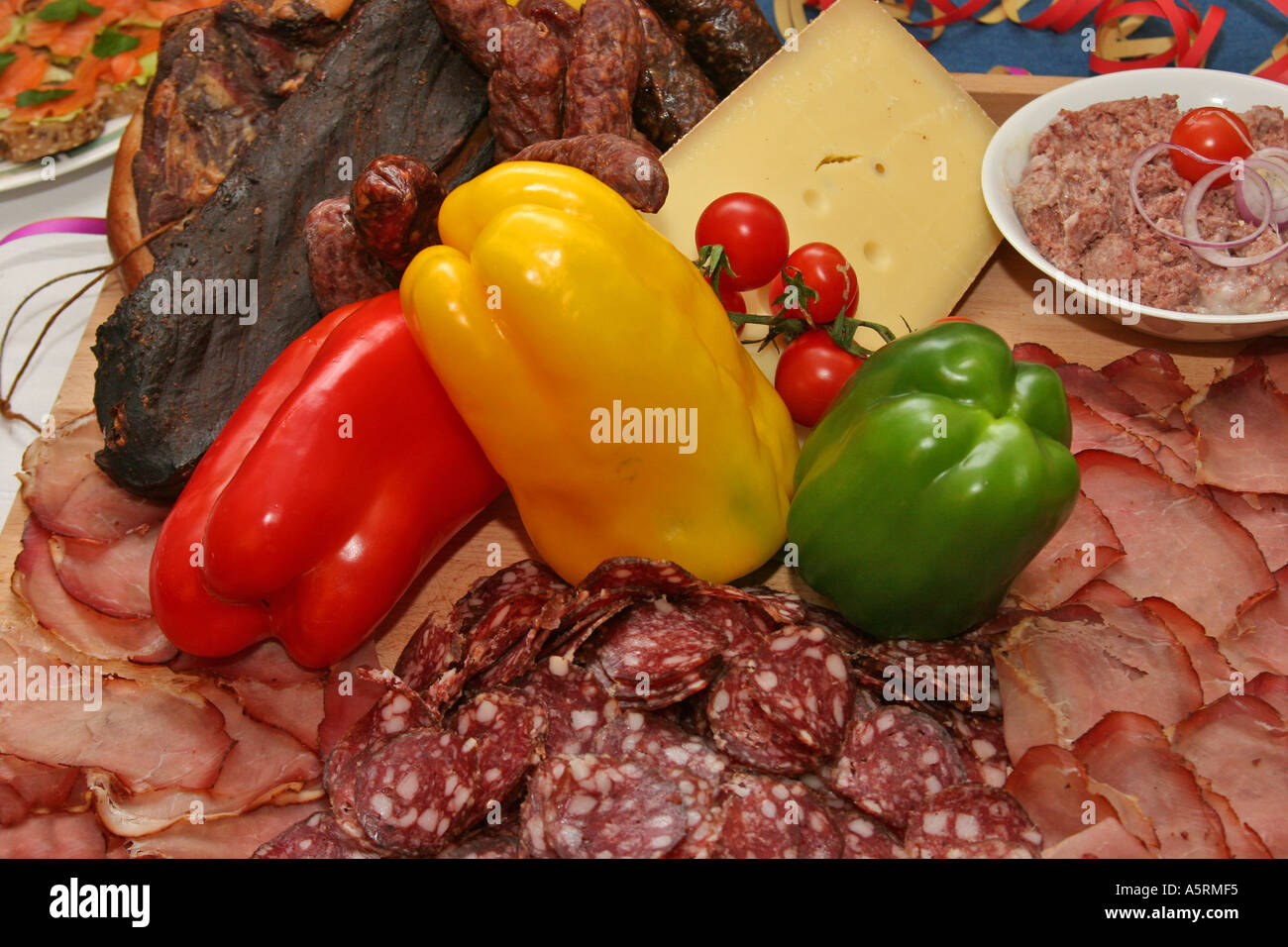 a country stile buffet different sorts of sausage Stock Photo