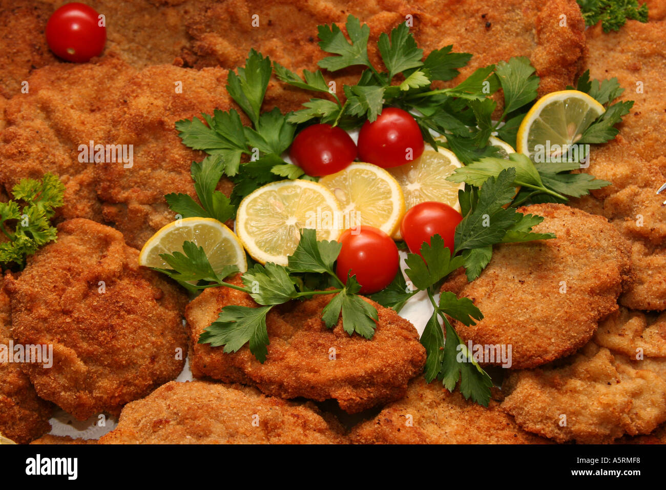 Wiener Schnitzel cutlet at a country stile buffet Stock Photo