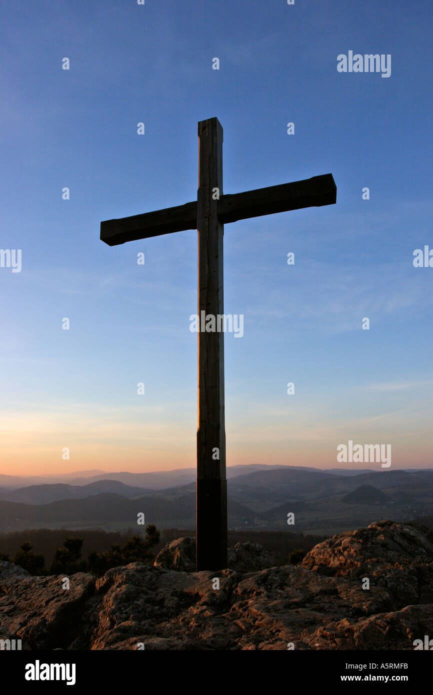 a wooden cross on the mountain Peilstein at sunset Lower Austria Stock Photo