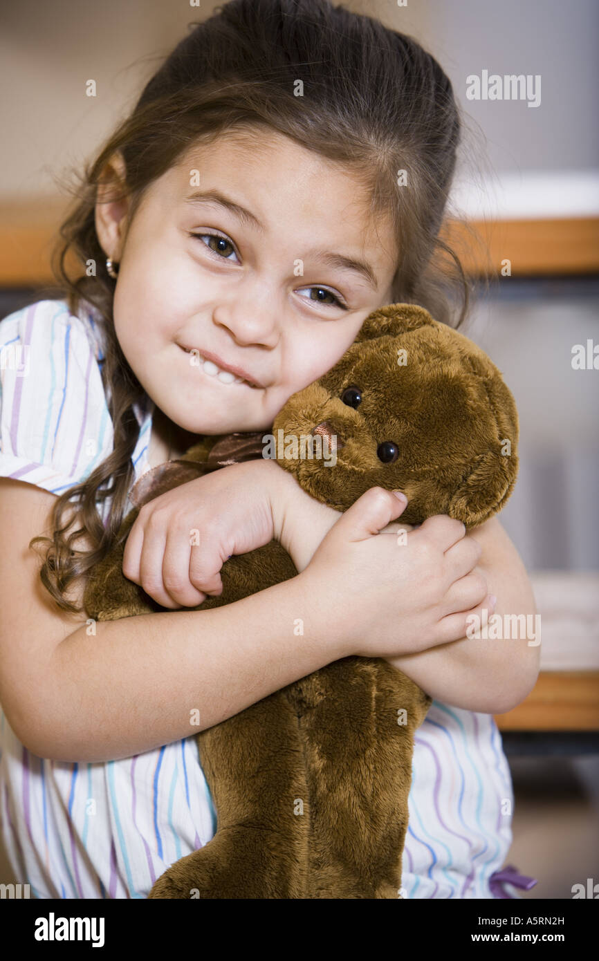 Young girl with teddy bear Stock Photo - Alamy