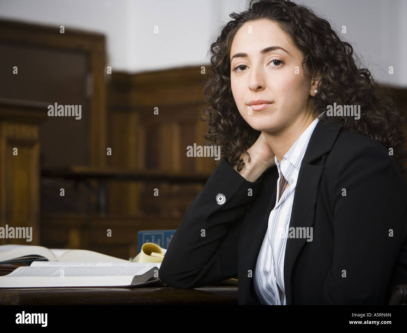 Female lawyer smiling in courtroom Stock Photo Alamy
