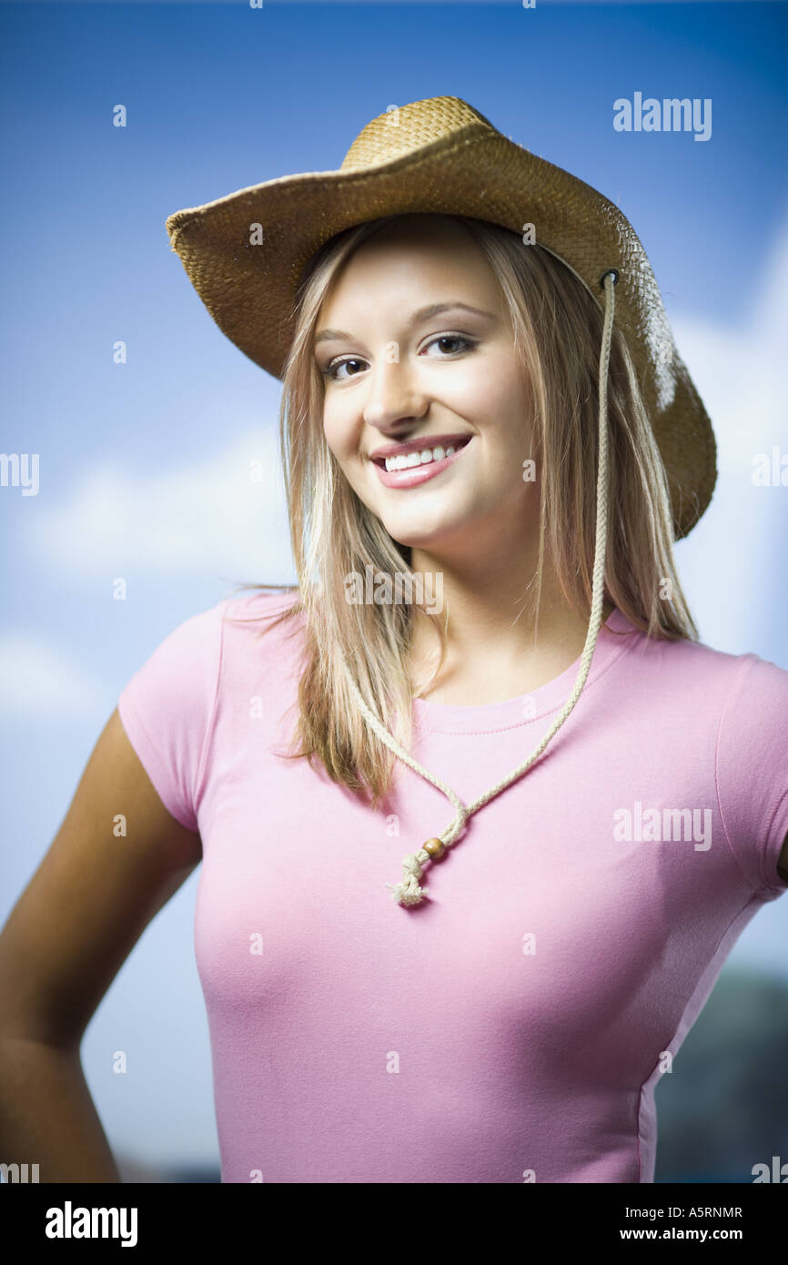Young woman wearing straw hat Stock Photo - Alamy