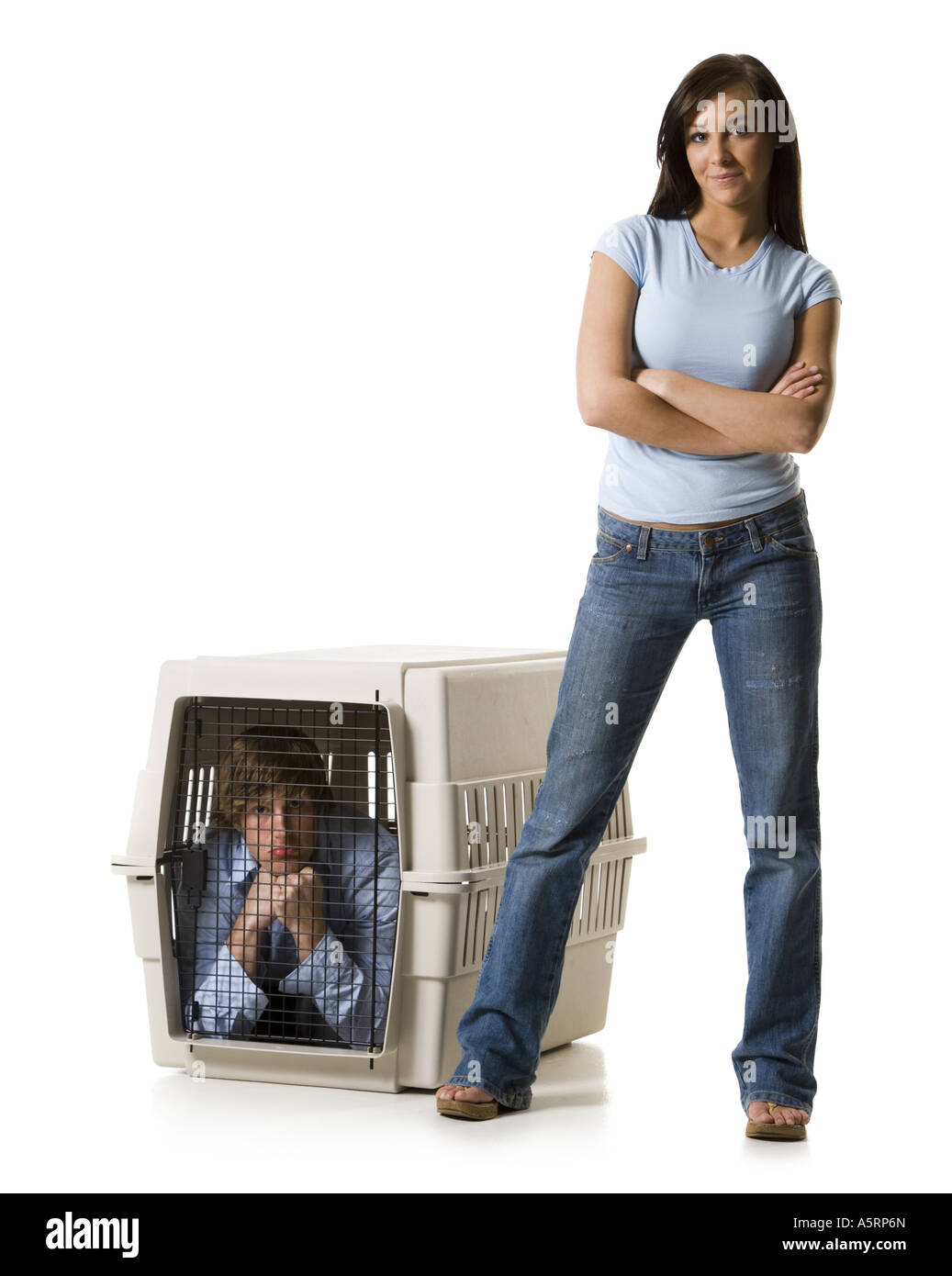 Young woman sitting on crate with boyfriend inside Stock Photo Alamy