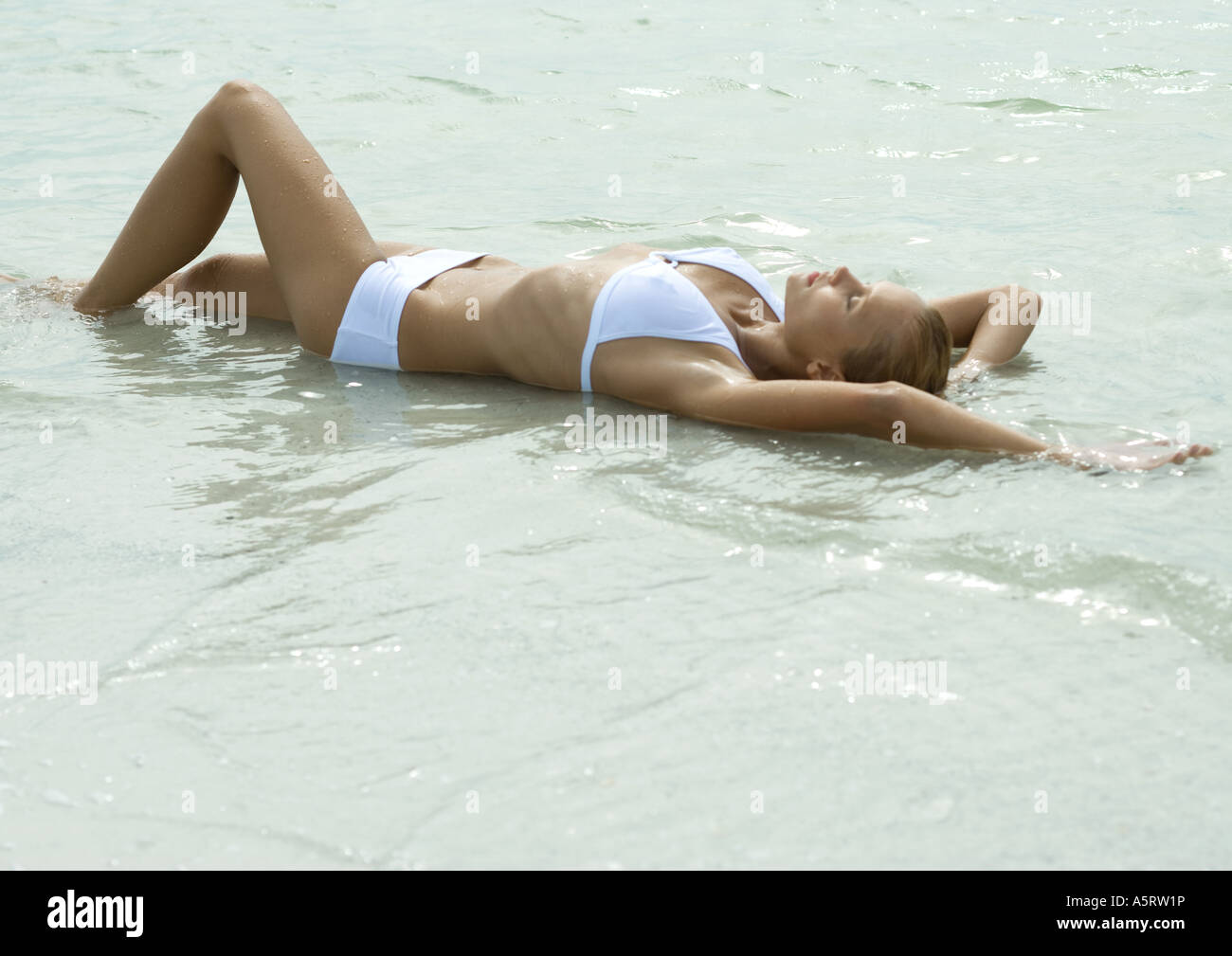 Women 20s in bikinis hi-res stock photography and images - Page 3 - Alamy