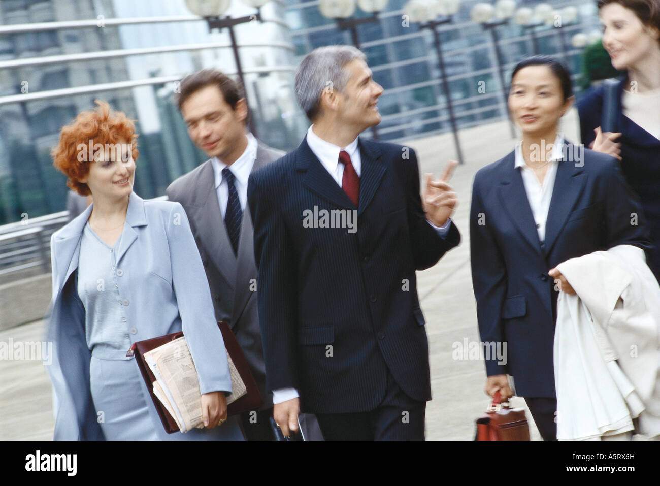 Walking group of men in suits hi-res stock photography and images - Alamy