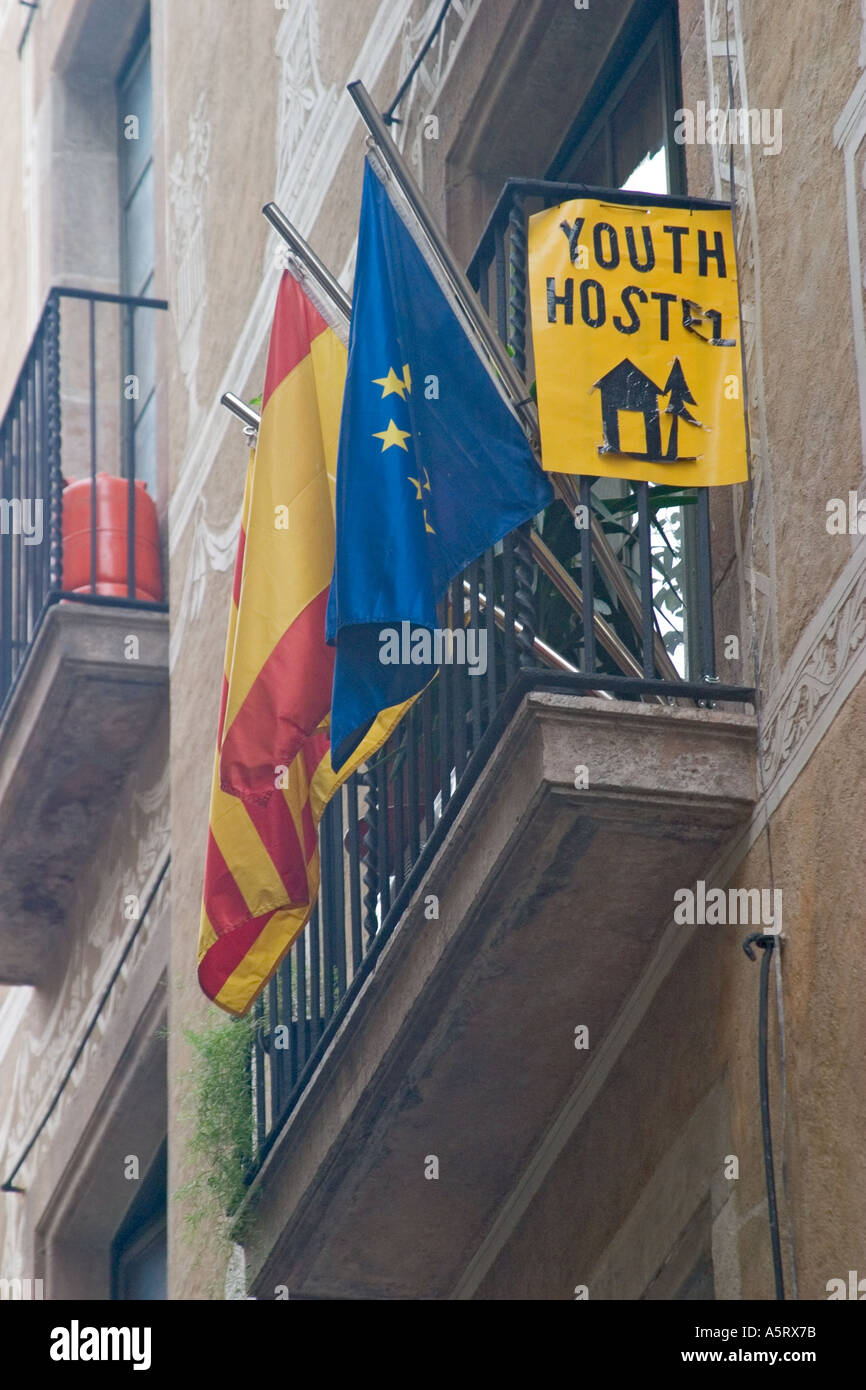Youth hostel in Barcelona Spain with Catalan and European flags in front Stock Photo