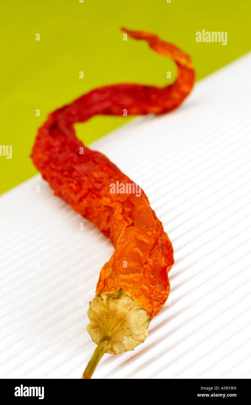 Red hot chili pepper on green and stripped white background Stock Photo ...