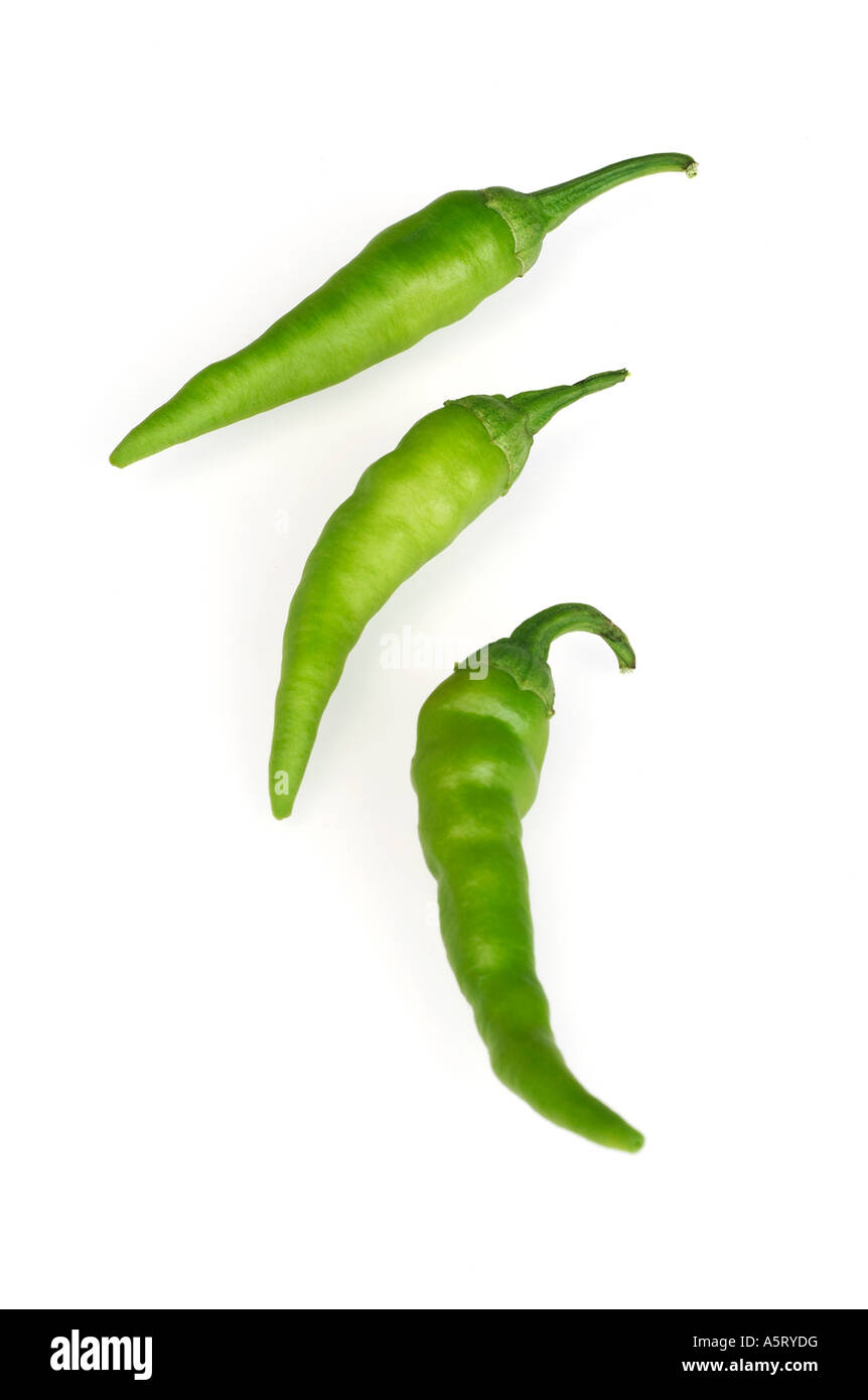 Green hot peppers on white background Stock Photo - Alamy