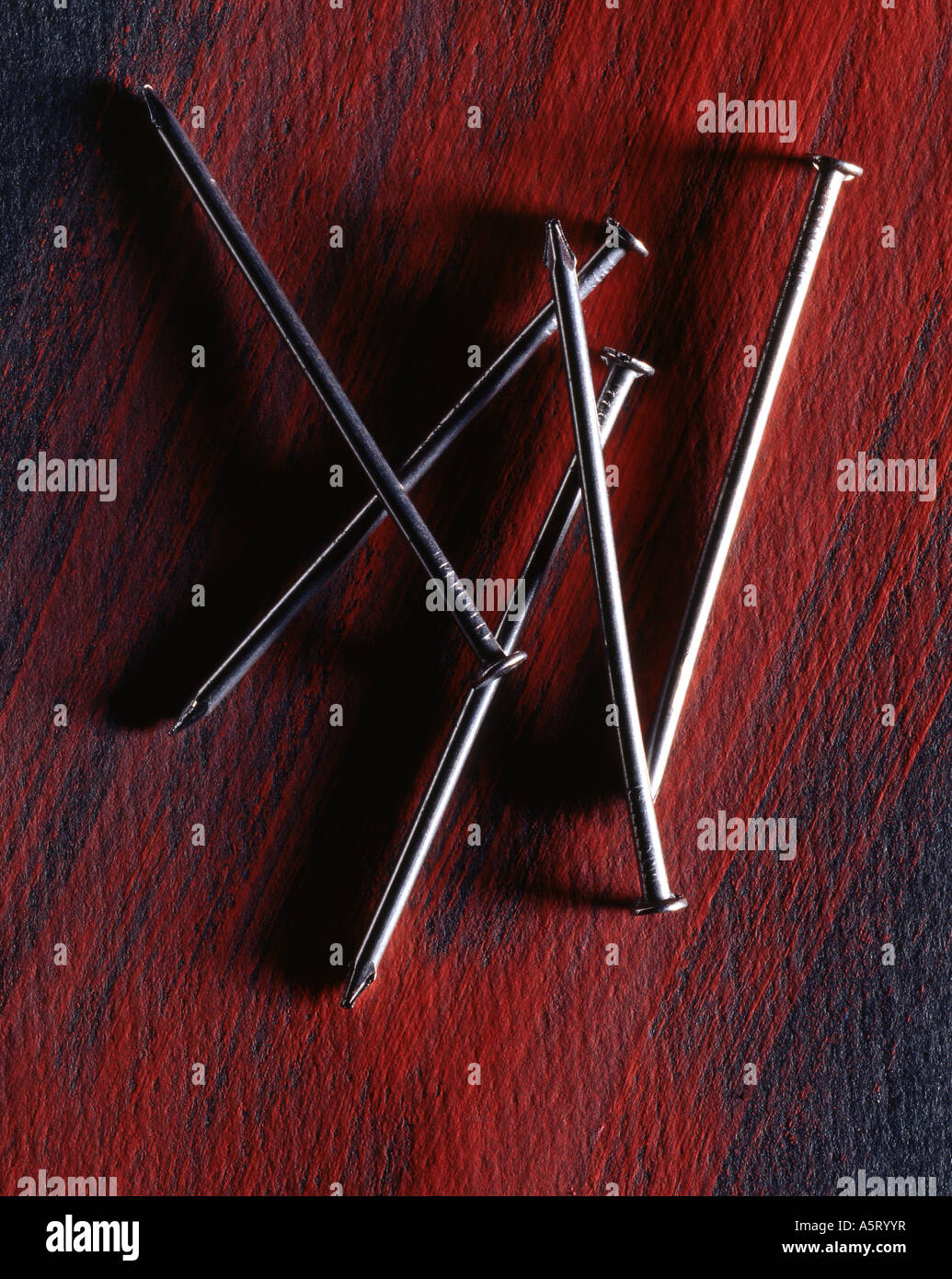 Nails on oil paint Stock Photo Alamy