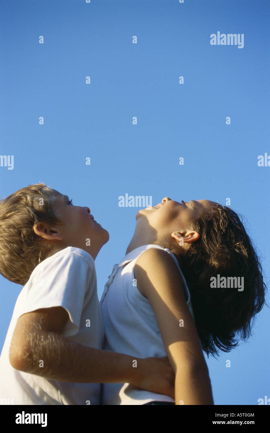 Two boys arms around other hi-res stock photography and images - Alamy