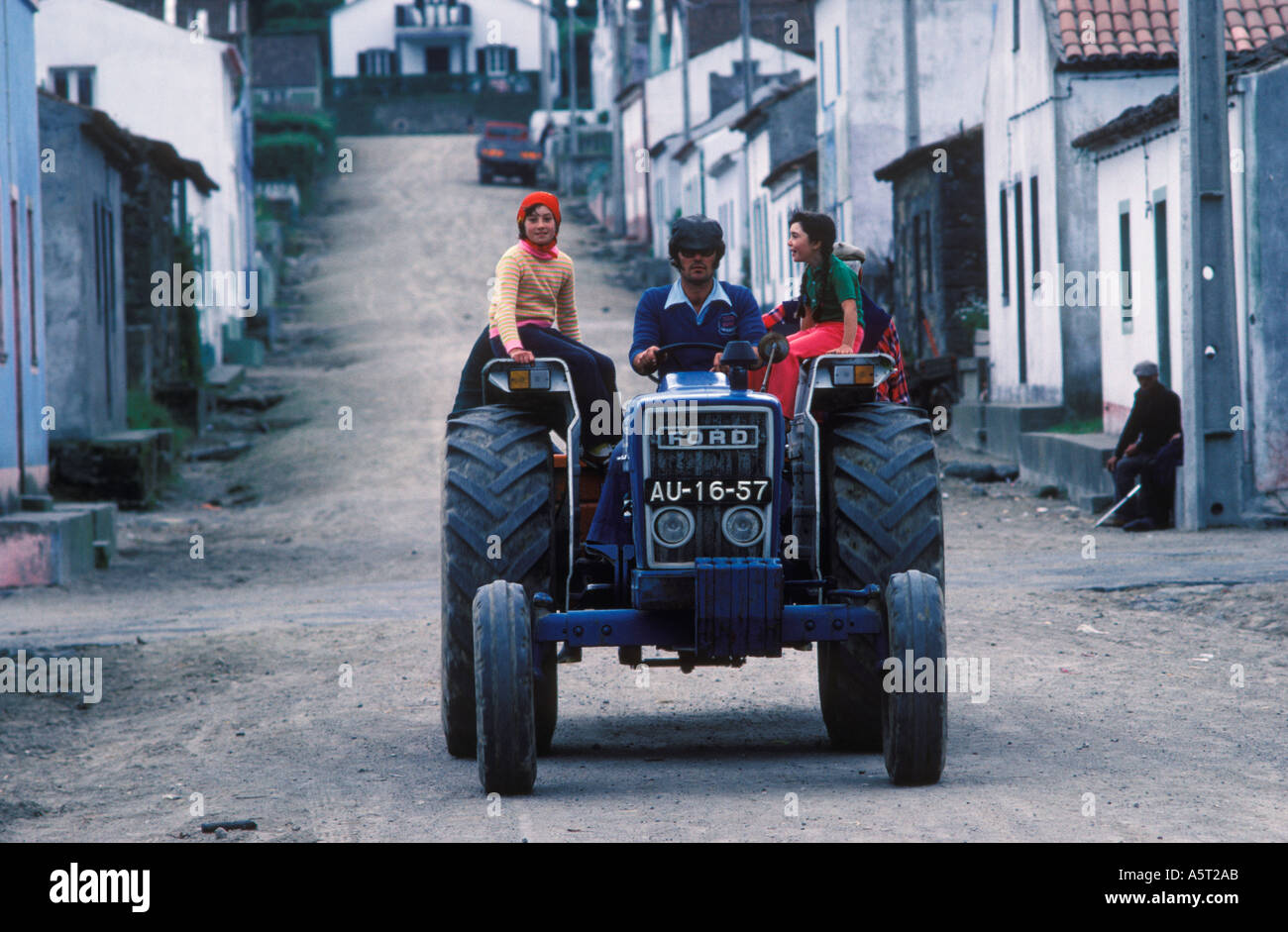 Azores Sao Miguel Island Portugal Tractor driver and children daily life  1980s HOMER SYKES Stock Photo