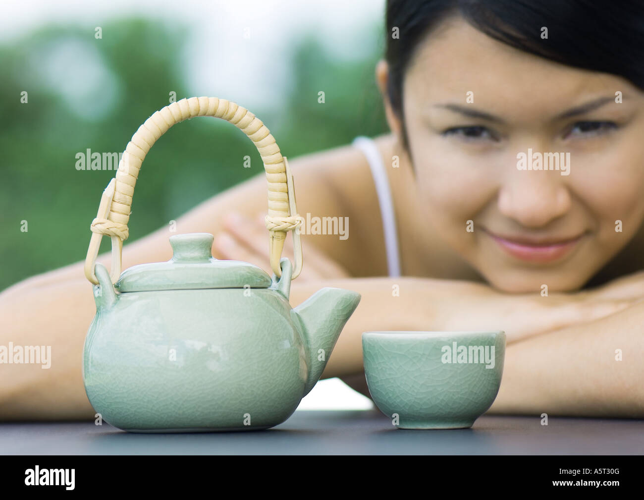 Woman with teapot and teacup Stock Photo Alamy