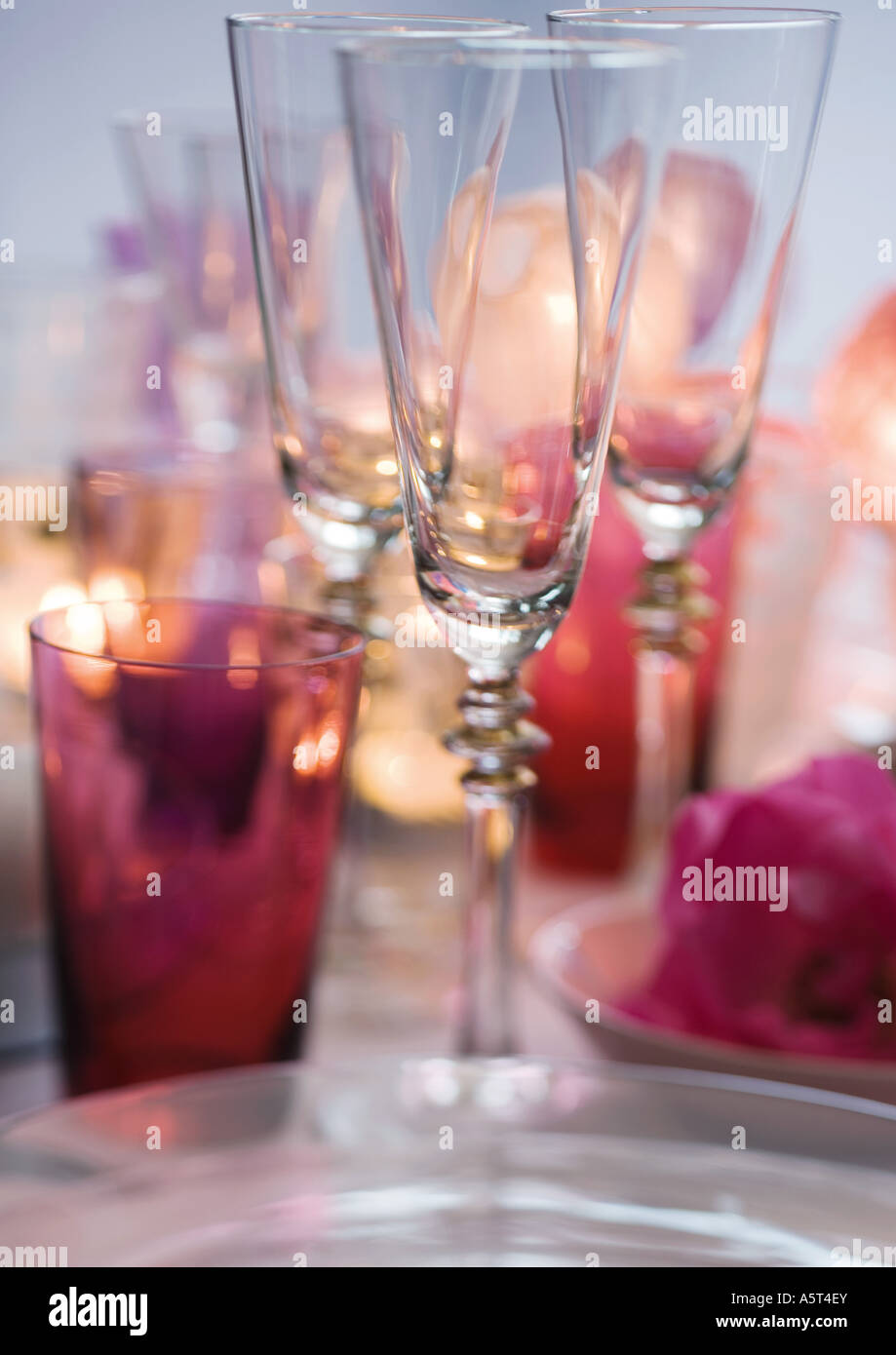 Place settings on table with champagne glasses hires stock photography