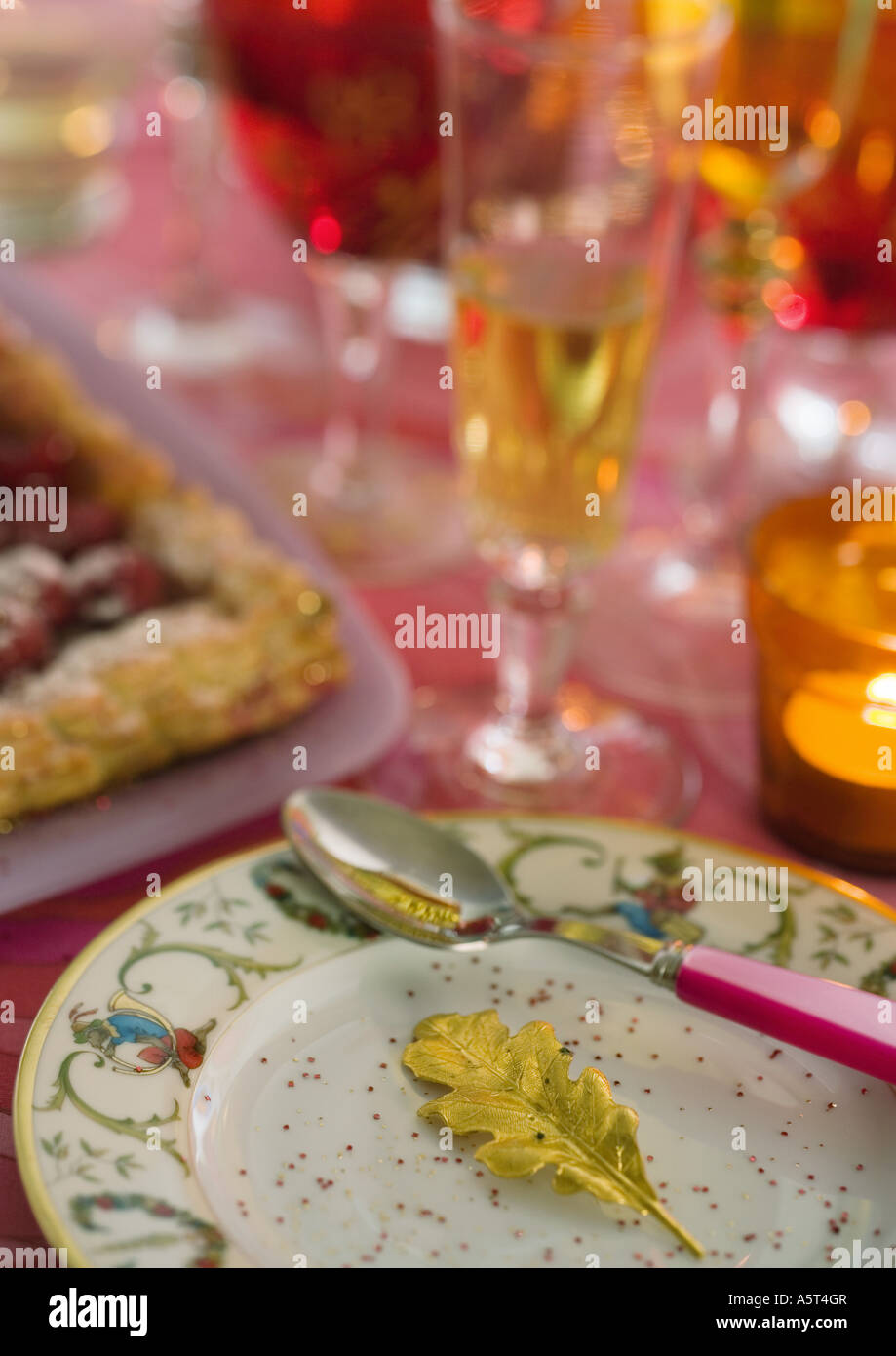Decorated table with place settings Stock Photo