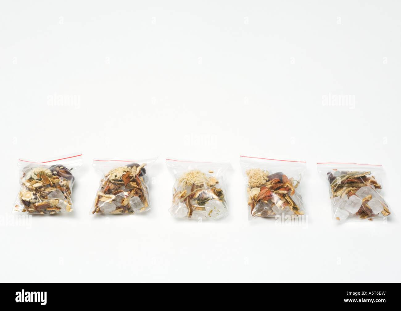 Baggies containing chinese herbal tea mixture Stock Photo