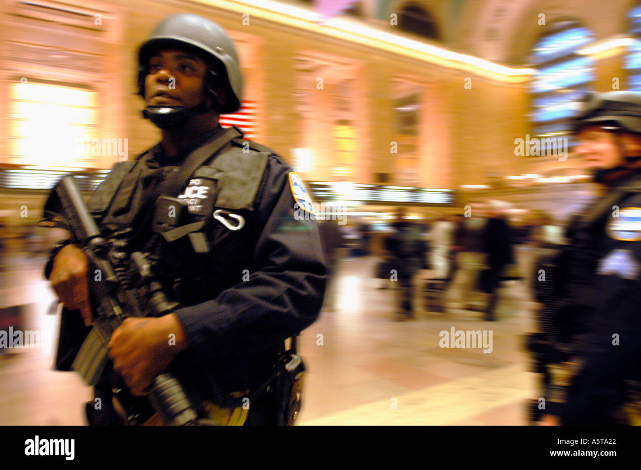 Heavily armed ESU officers patrol in Grand Central Terminal  Stock Photo