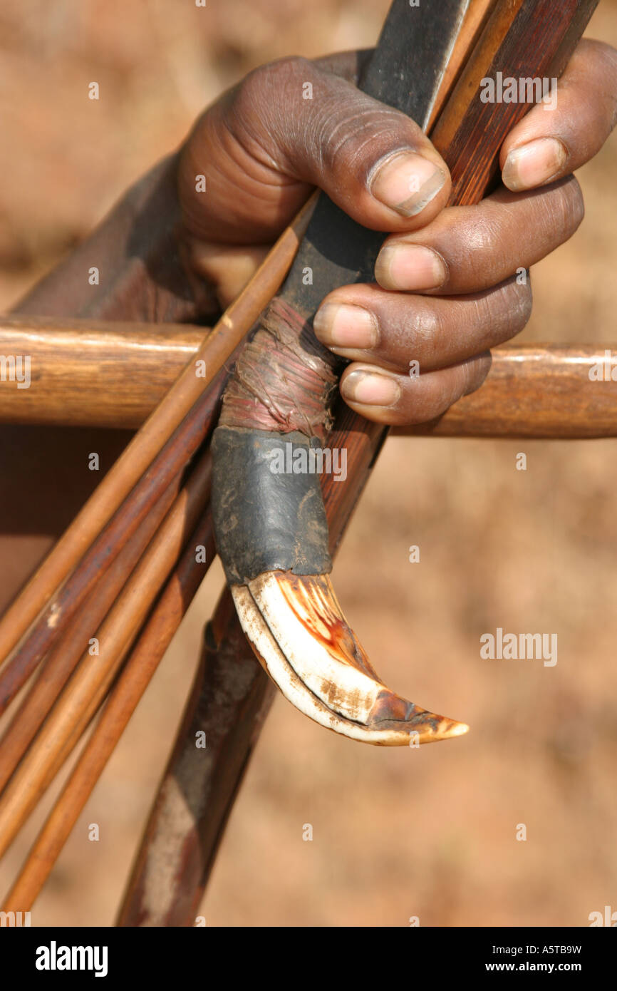 Bonda tribes men carry bow,arrows and knives for hunting.Orissa India