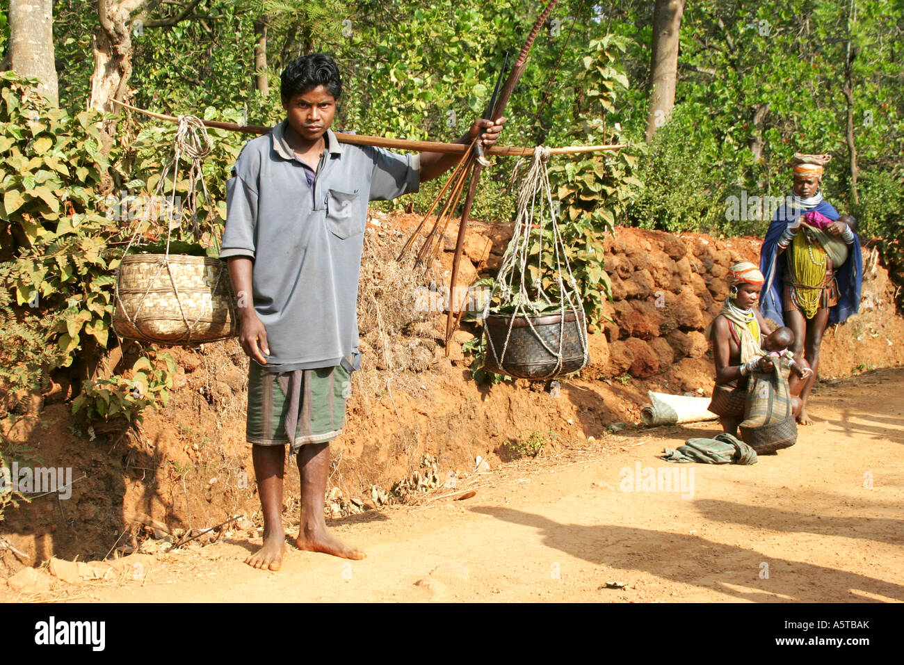 Bonda tribal men carry bows,arrows and knives for hunting.Orissa India Stock Photo Alamy