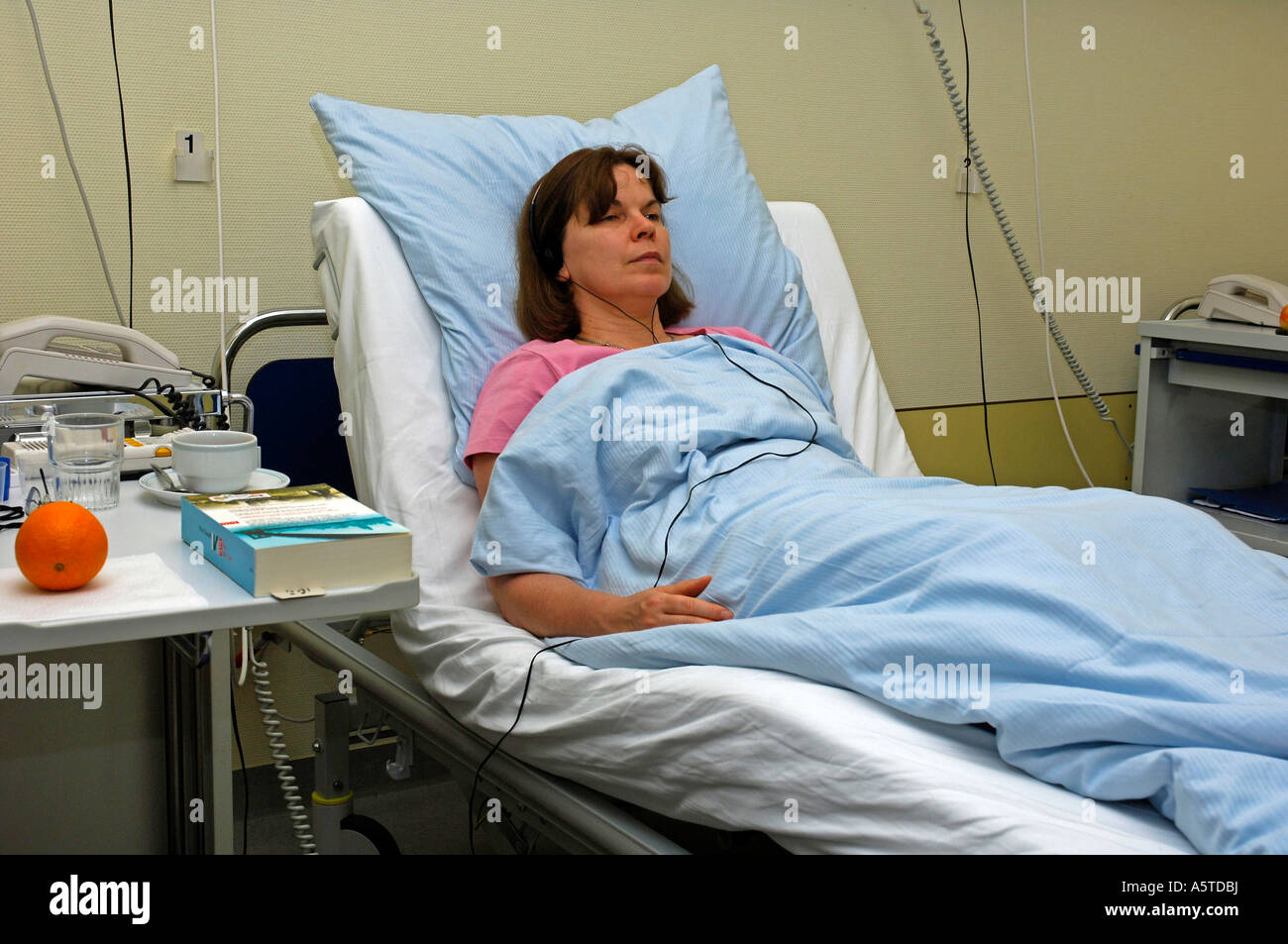 ill woman in hospital Stock Photo
