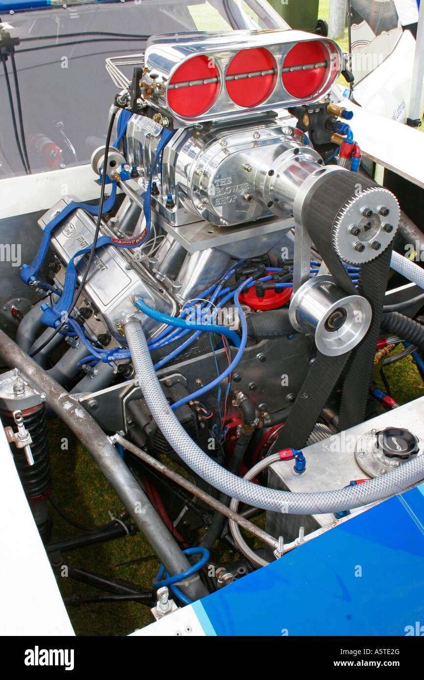 Roots style supercharger sitting high on top of a 600ci plus Drag racing V8 engine Stock Photo