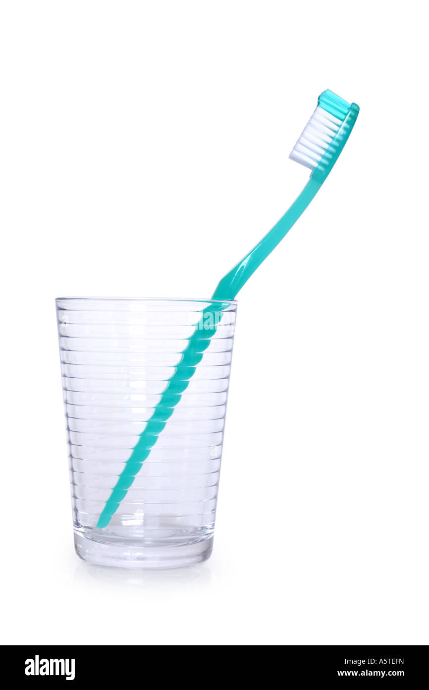 Toothbrush in Glass cut out on white background Stock Photo