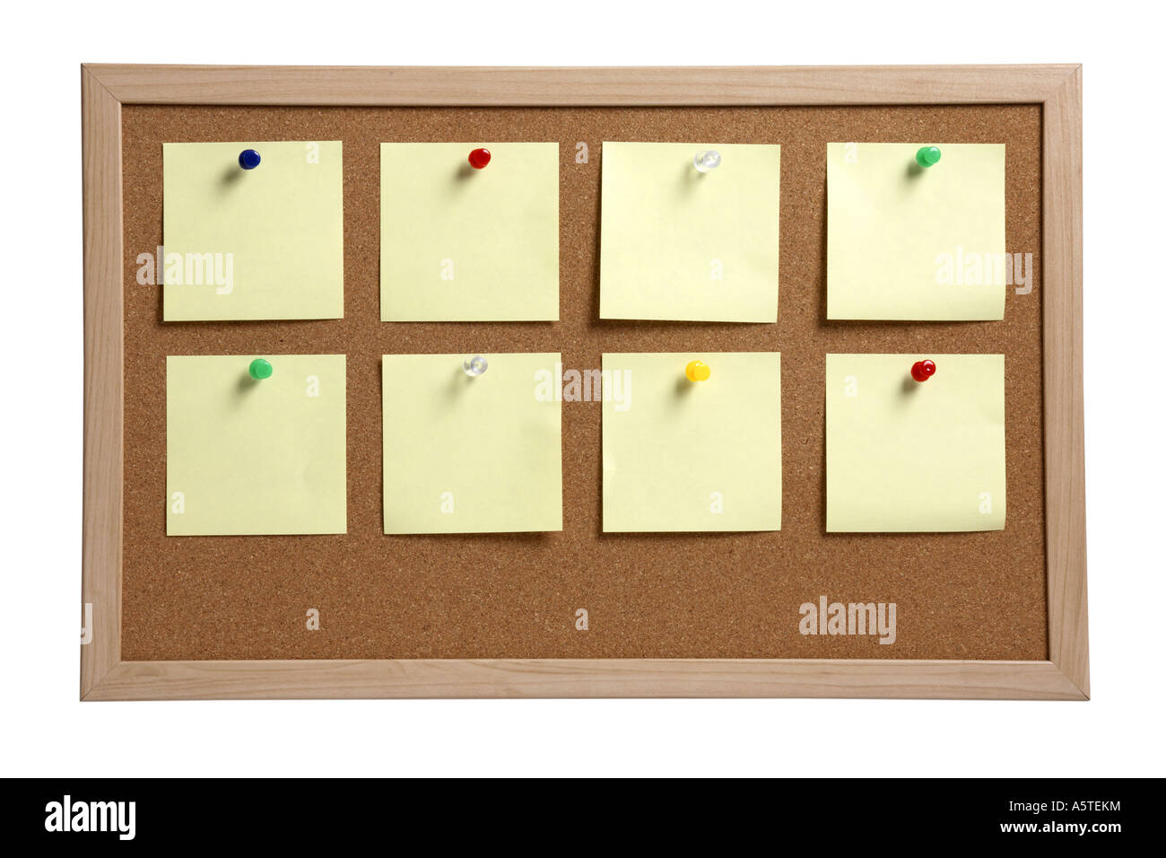 Bulletin Board with Yellow Notes cut out on white background Stock