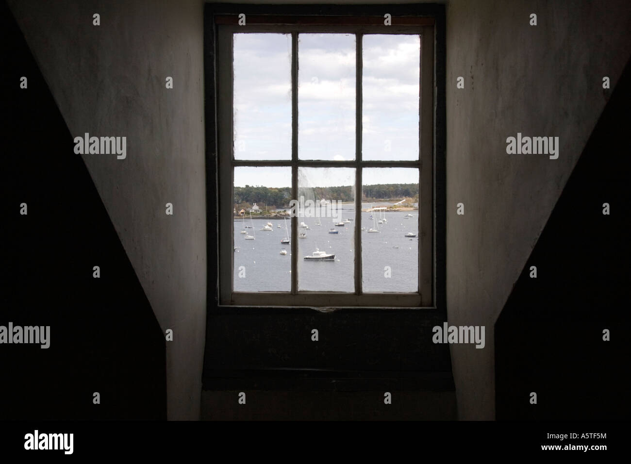 View through a Window pane glass view boats harbor ocean scene Maine