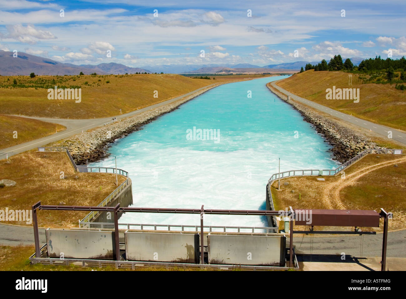 Hydro power canal exiting Lake Tekapo New Zealand Stock Photo